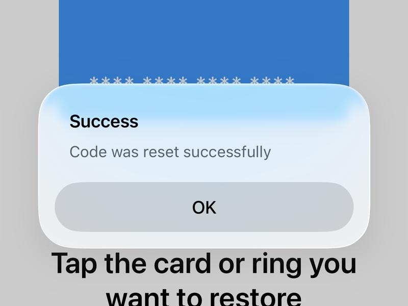 Phone showing Tangem wallet recovery using third backup card